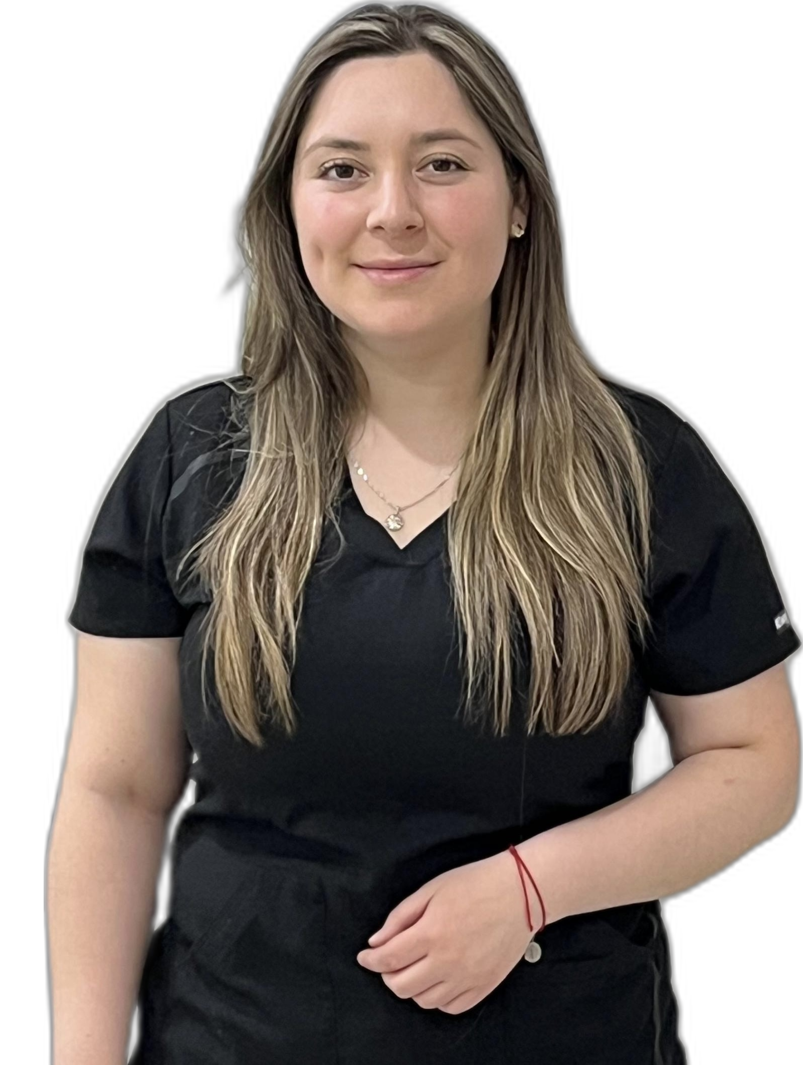 Dra. Javiera Comesaña, cirujana dentista en Coyhaique, con delantal clínico